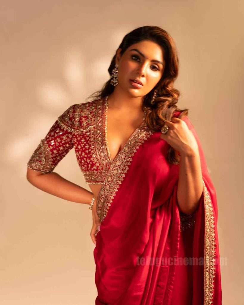Samyuktha stuns in a radiant red Saree